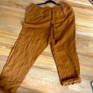 A pair of pants with drawstrings and pockets
